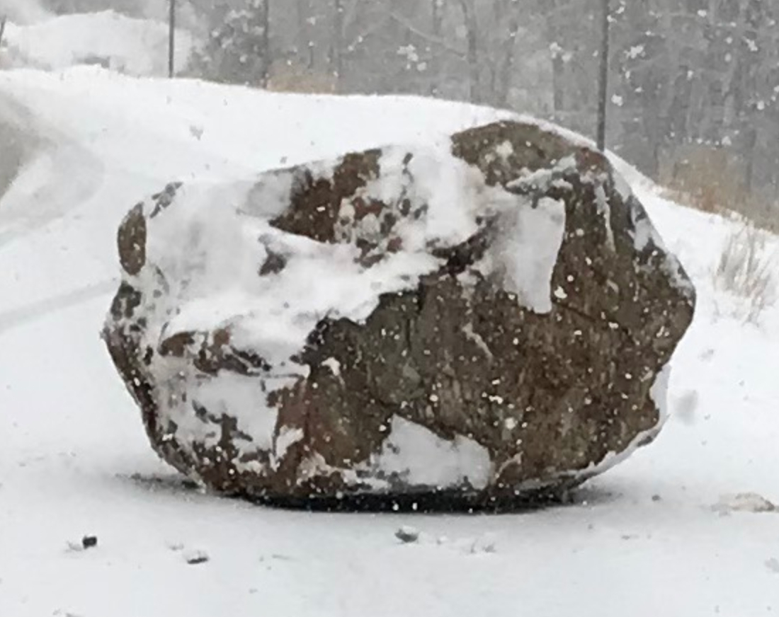 Large boulder the size of a small boulder