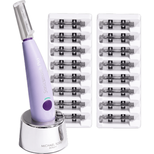 SonicSmooth Pro+ device on its charging cradle beside two trays of dermaplaning tip refill cartridges