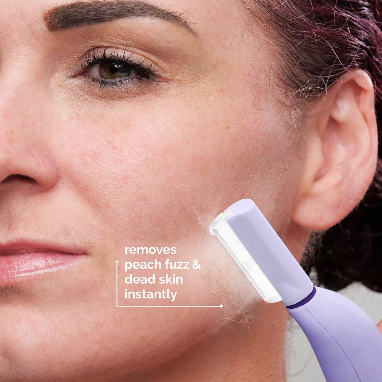 Lavender A close-up of a woman using the Michael Todd Beauty Sonicsmooth Pro+ System for sonic dermaplaning