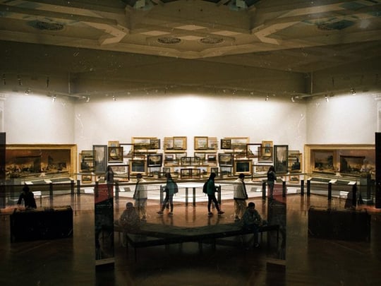 People looking at art in a museum