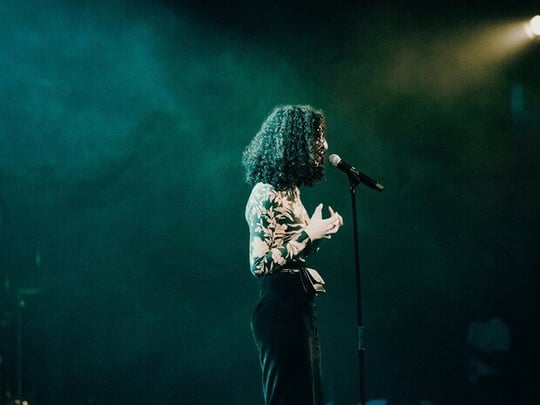 Woman speaking onstage