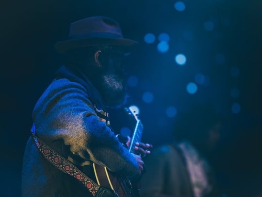 Man playing a guitar