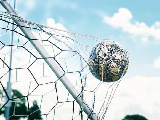 Football in the back of a net