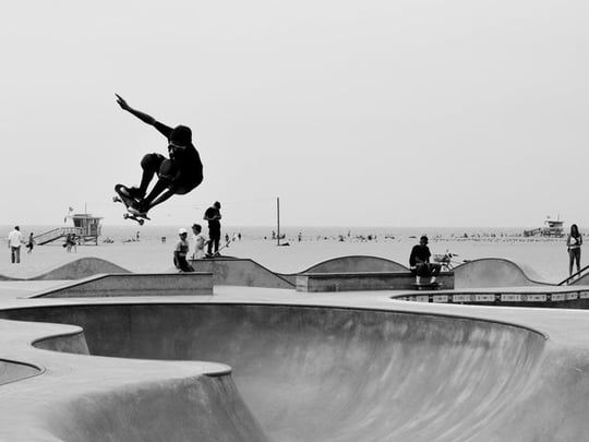 Man skateboarding in a skateboard park