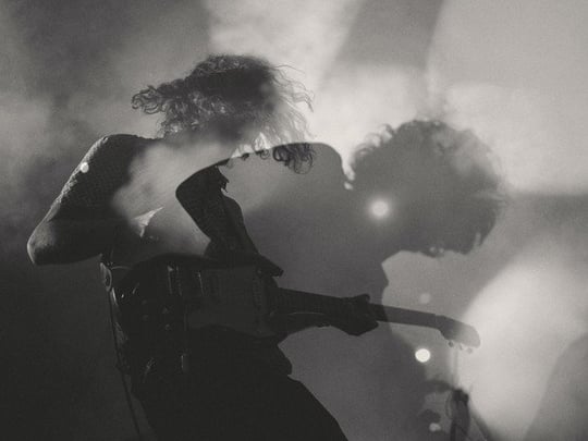 Man playing a guitar