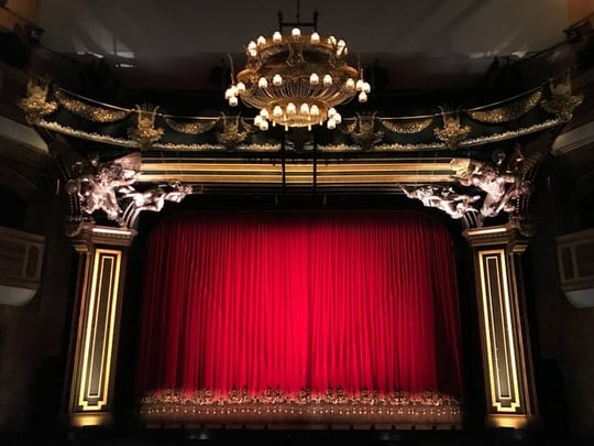 Red curtain at a performance theatre