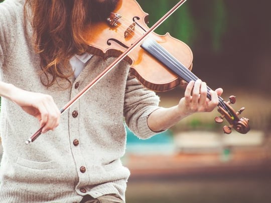 Person playing a violin