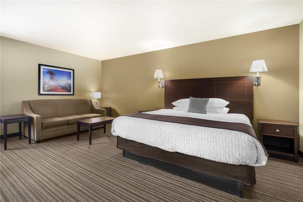 1 King Bed w/ Sofabed