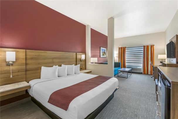 Suite - 1 King Bed w/ 2 TVs