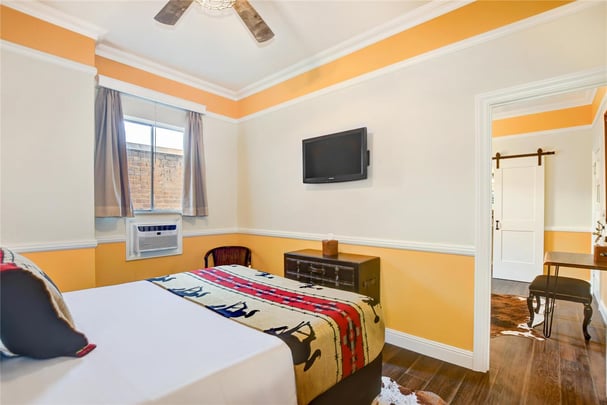 Queen Suite with Family Room and 2 Bedrooms