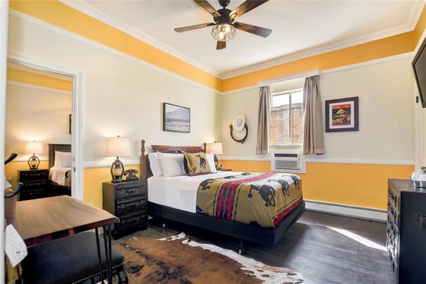 Queen Suite with Family Room and 2 Bedrooms