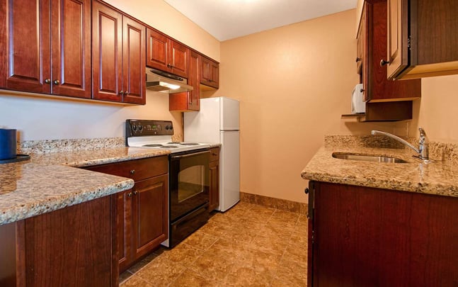 Two Queen bed suite with a full kitchen