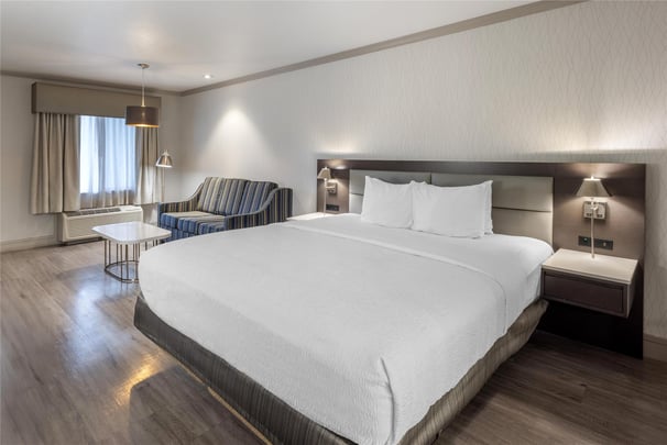 1 King Bed w/ Sofabed