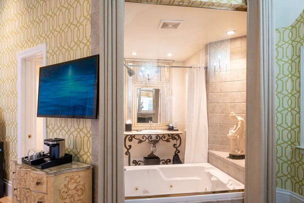 King Suite with Balcony, Jetted Tub, Fireplace, and Sitting Area