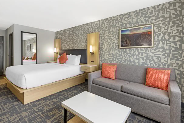 1 King Bed w/ Sofabed