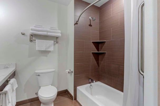 Relax and Unwind - Your Tranquil Oasis Awaits in the Guestroom Bathroom with a Soothing Tub.