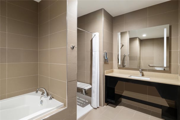 ADA King Suite with Roll In Shower Bathroom