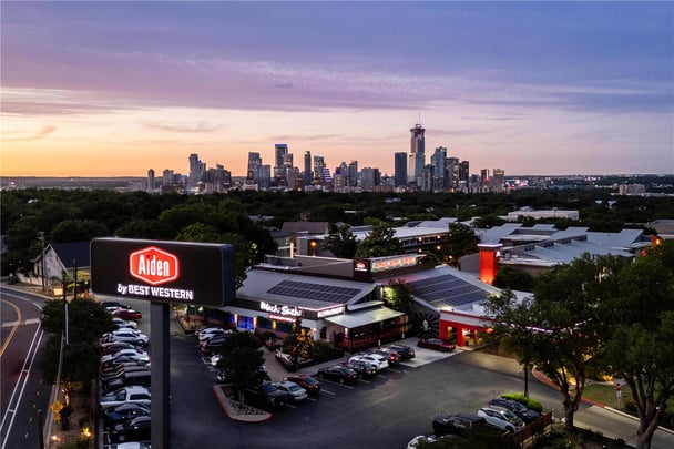 Exterior Sunset with City Skyline