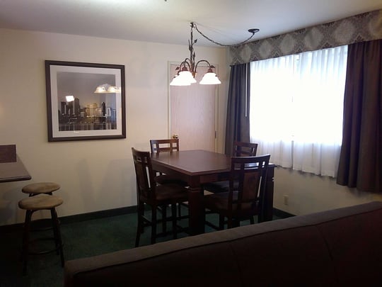 Suite-1 King Bed with Living Room and Kitchen