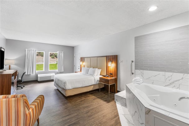 King Suite with Whirlpool Fireplace and Walk in shower