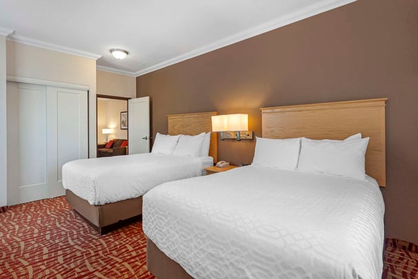 Suite | 1 King & 2 Double Beds | 2 Bedrooms