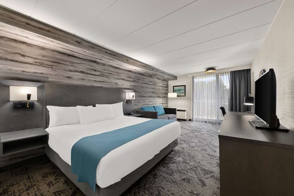 King Room With Sofa Bed & Balcony | Walk In Shower