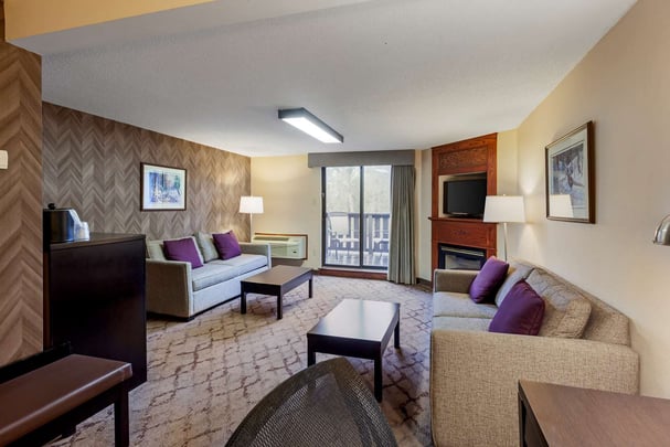 King Fireplace Room with 2 Double Sofa Beds