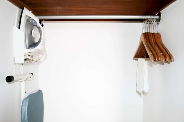 Iron and Ironing Board in Room