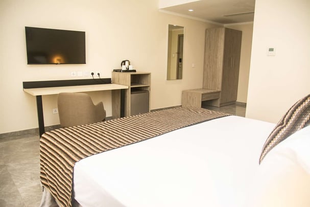 Superior room bedding and workspace