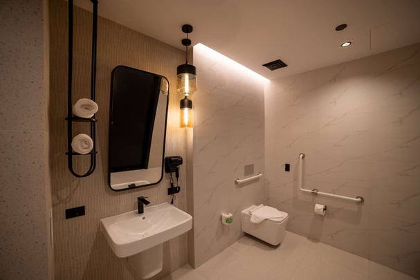 Accessible king size bed room bathroom