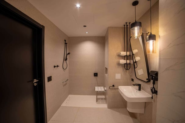 Accessible king size bed room bathroom