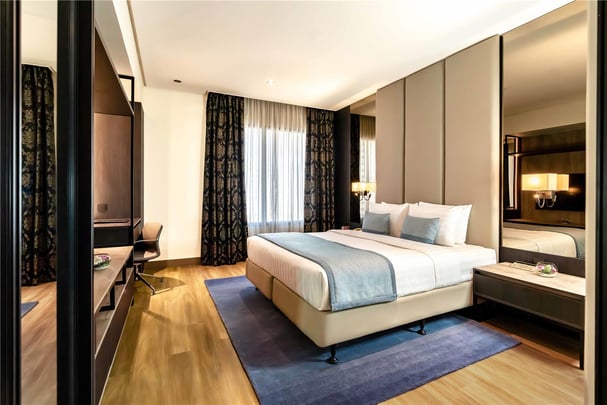 Premium One Bedroom Suite BEDROOM