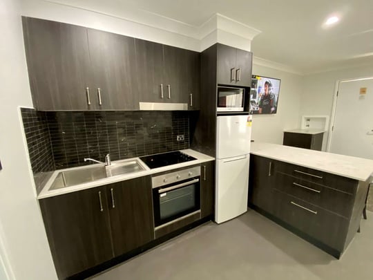 Executive Suite - 1 Queen 2 Single Beds