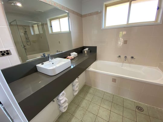 Exec Family Bathroom bath and vanity