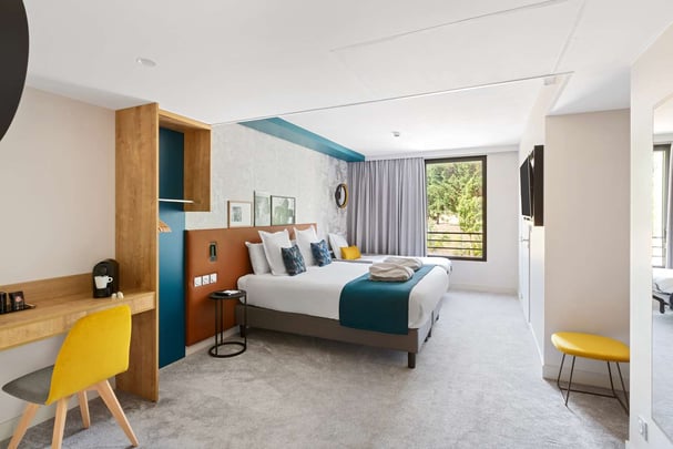 Guest Room with One Queen Size Bed and One Single Sofabed