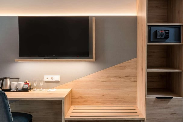 Desk, safe and flat screen TV