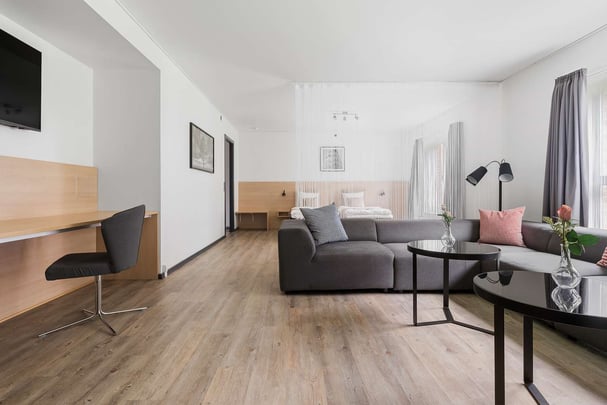 Family plus living room with desk