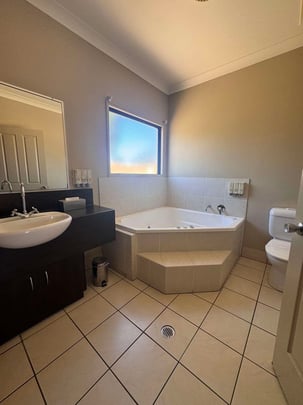 King Spa Room bathroom with Spa bath