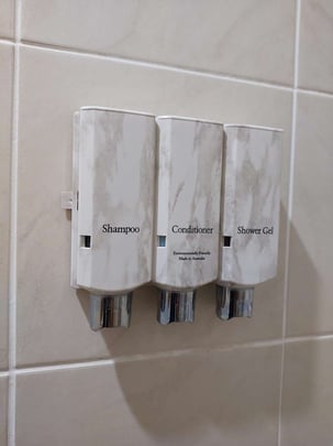 Shower amenities with dispenser