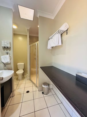 Family suite bathroom with shower