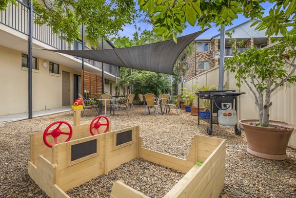 family playground and bbq alfresco areas