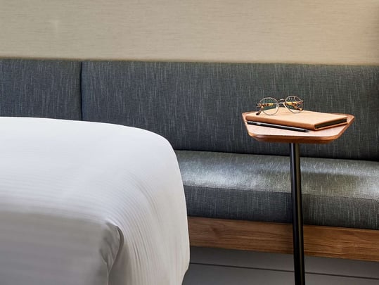 Aiden Darling Harbour close-up book and glasses