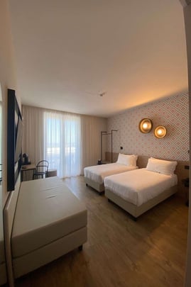 Guest Room with One Queen and One Twin Size Bed