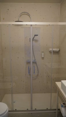 Family Guest Room Bath Includes a Glass Enclosed Walk-in Shower