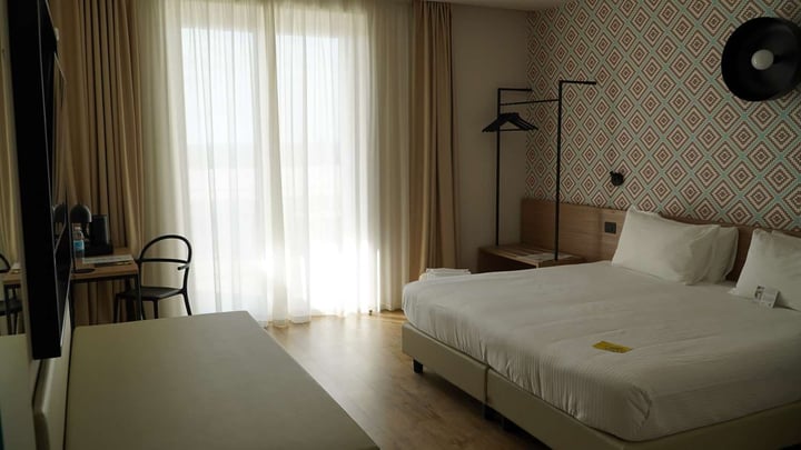 Guest Room with One Convertible Queen Bed and One Twin Bed