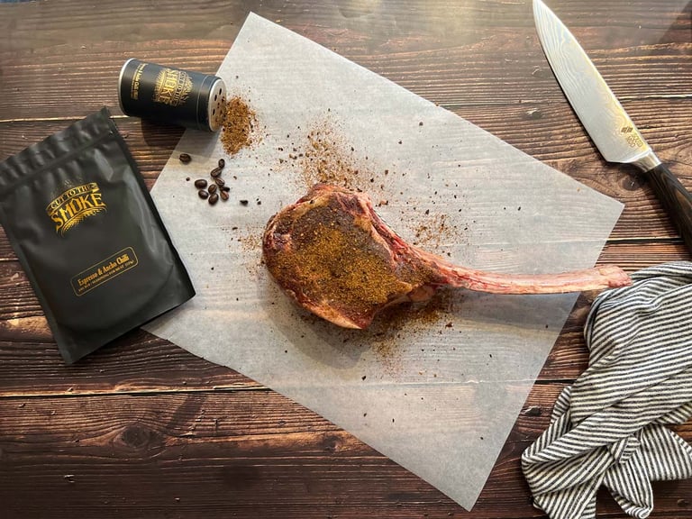 Espresso and ancho chilli tomahawk steak on wooden board