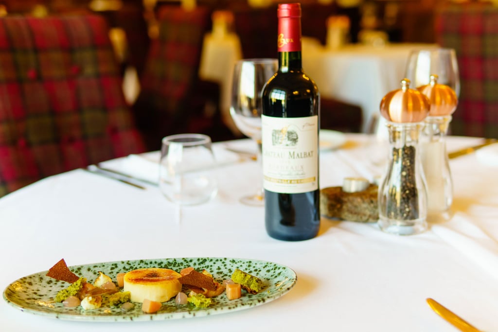 creme brulee and a bottle of wine at two bridges hotel on dartmoor