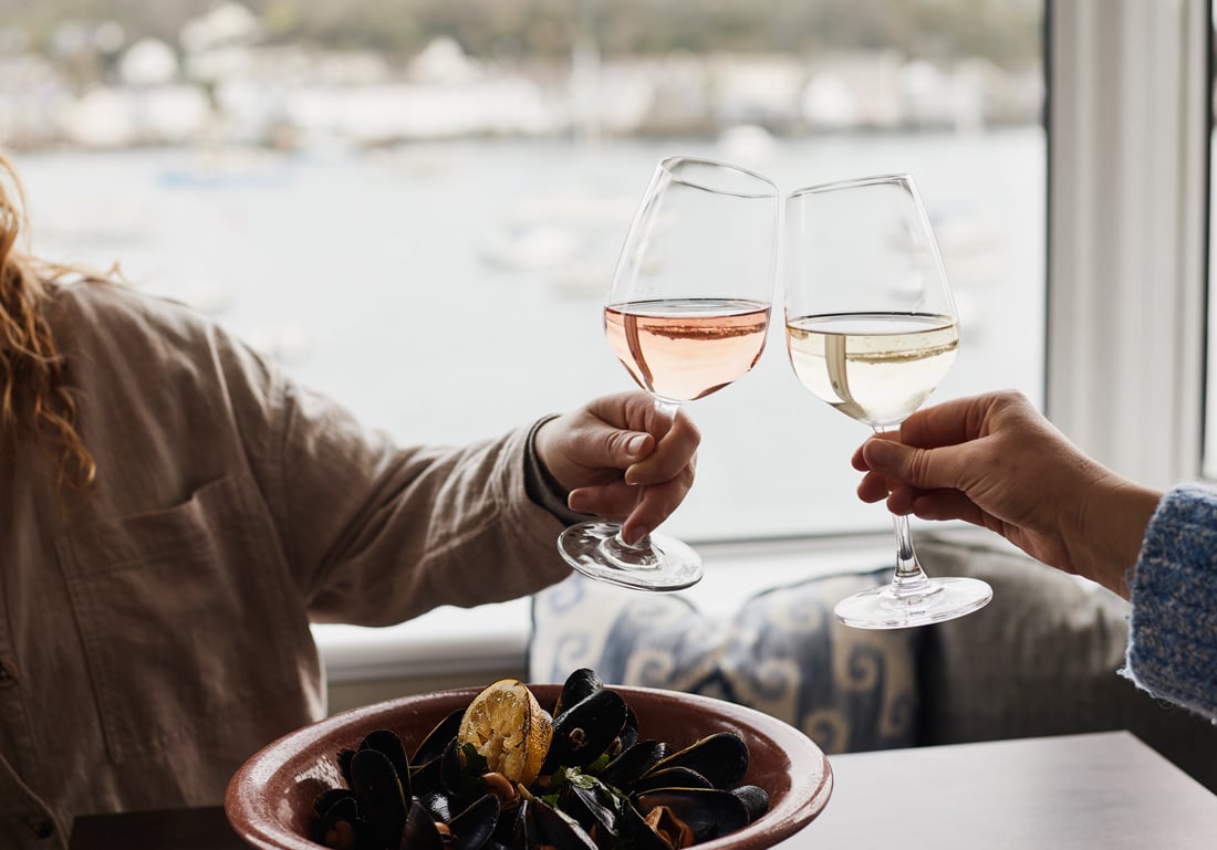 people dining at Water's Edge Restaurant at The Greenbank Hotel in Falmouth