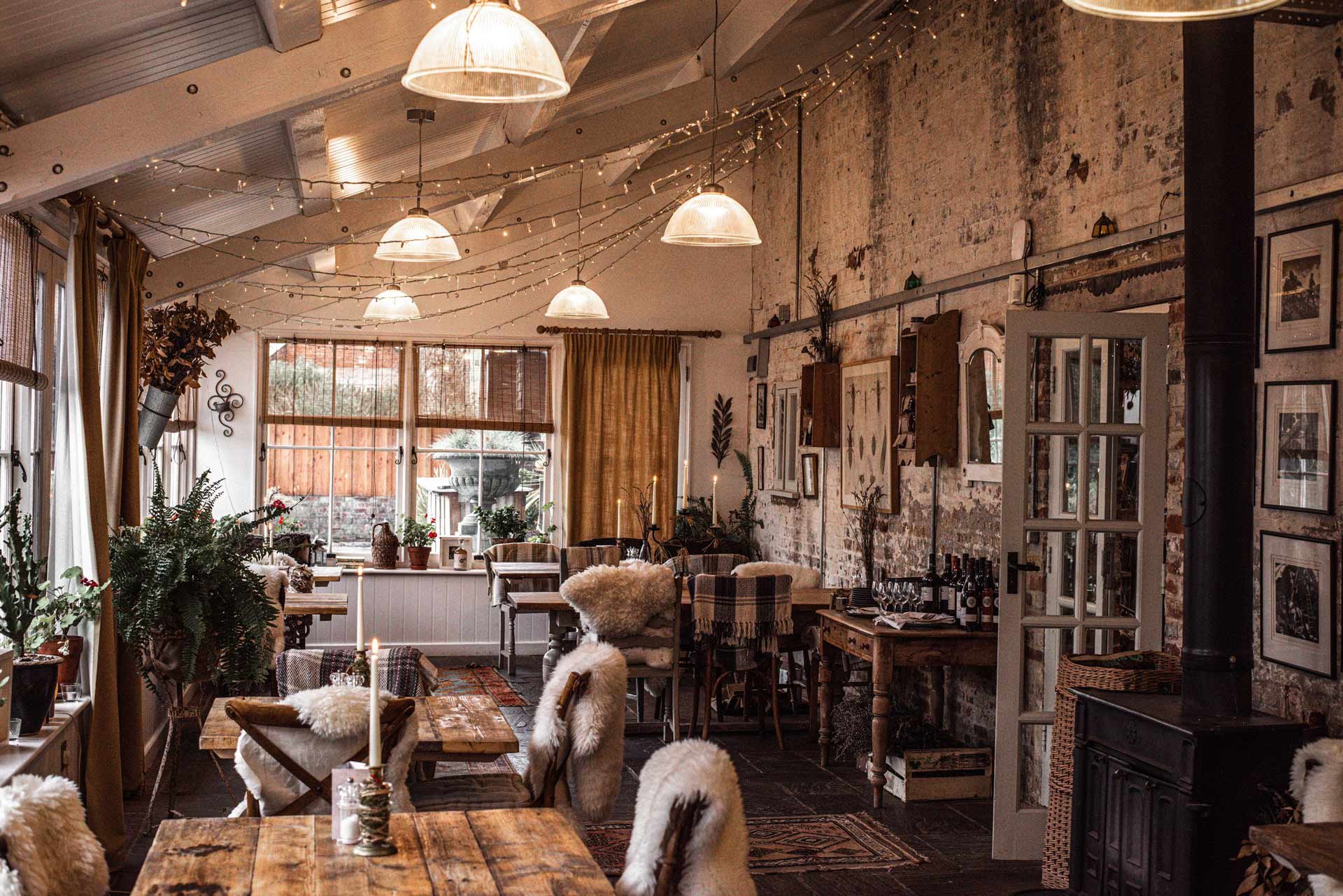 Pythouse Kitchen Garden dining room, cosy for a festive gathering