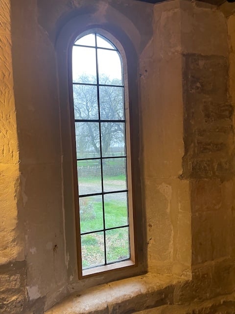stone mullion windows in Grade 2 property